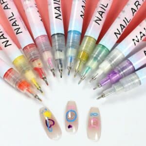 12-color fine-tip nail art pen set arranged in a fan shape with colorful nail design examples on press-on nails