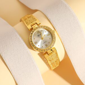 Women’s gold watch with white dial and diamond accents