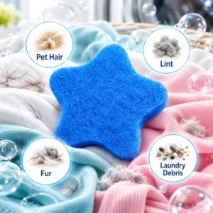 Blue star-shaped pet hair remover for laundry surrounded by clothing, pet hair, lint, and laundry debris